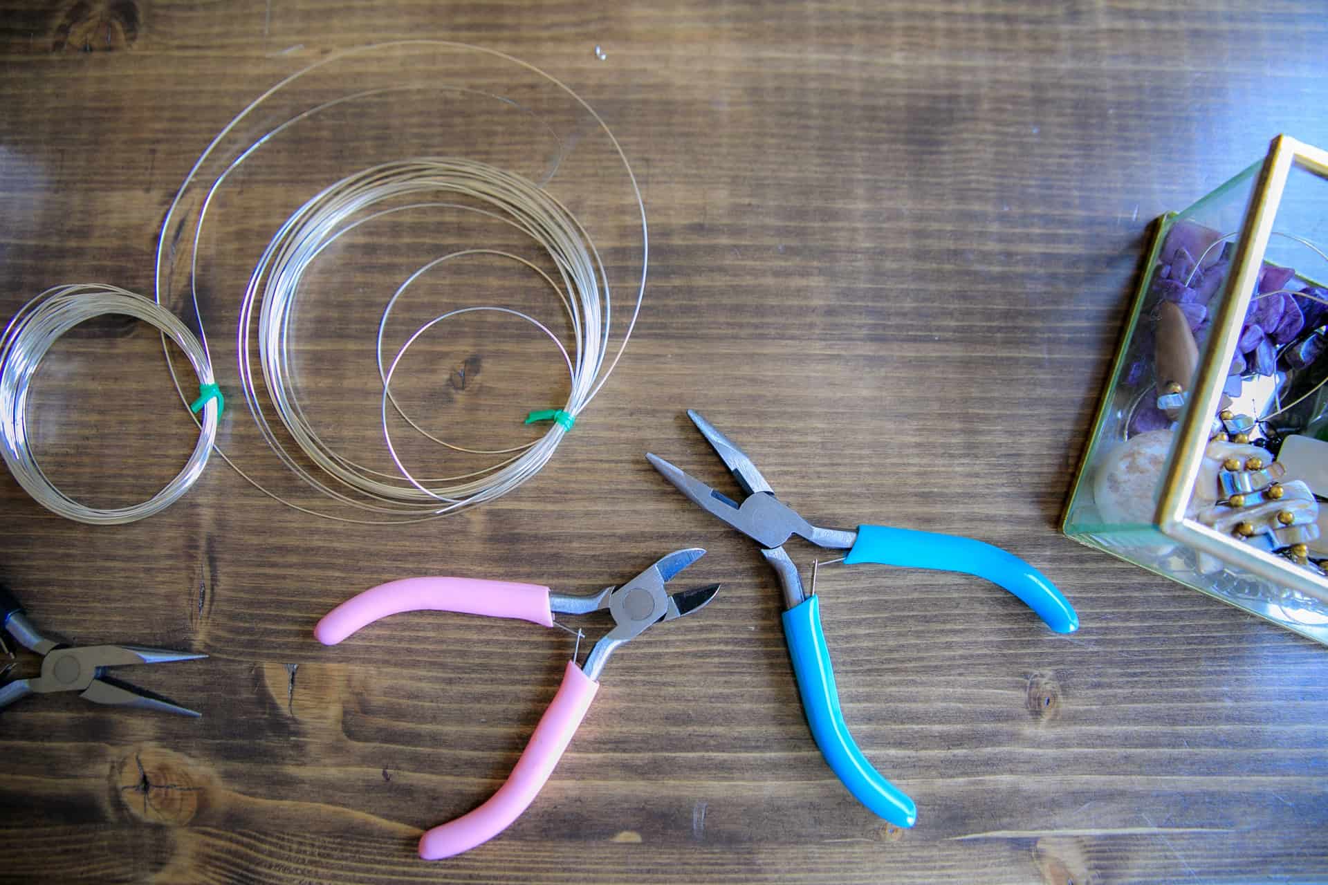 Workshop tools laid out flat on a bright bench
